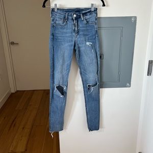 H&M distressed skinny jeans